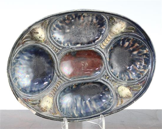 A French Palissy style lead glazed earthenware oval dish, 16th / 17th century, 23cm, rim chip and restoration